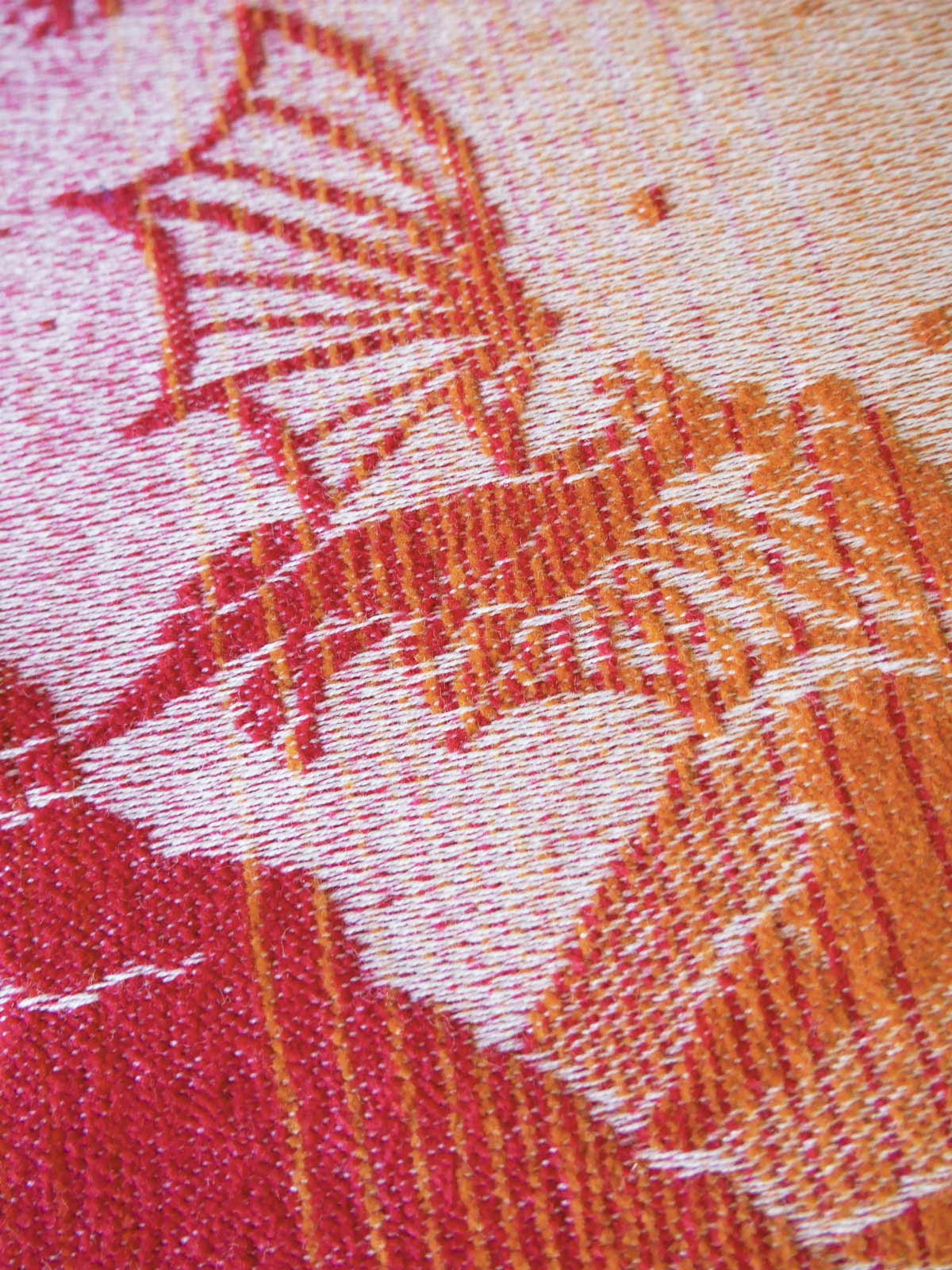 Close up of Smaug in Oscha baby wrap.