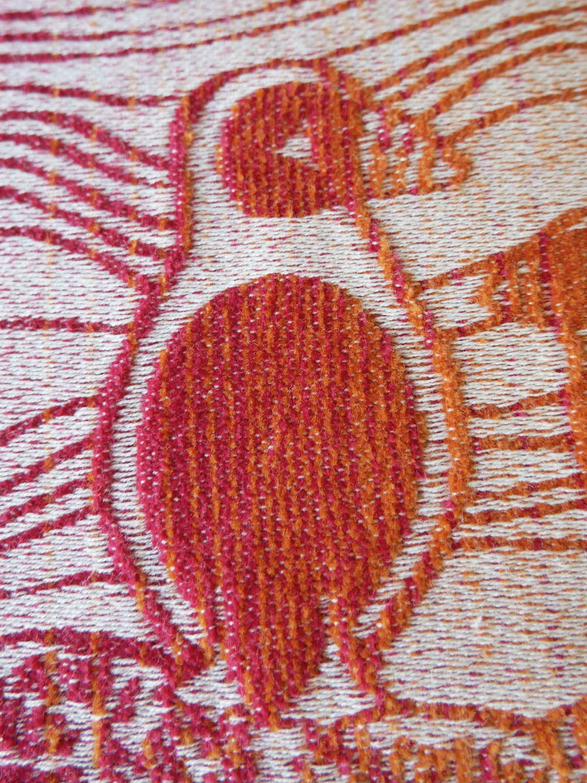 Close up puffin chenille baby wrap fabric.